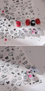 Detail of silver laser embossed nail stickers with cute cartoon dog and rabbit patterns