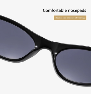 Close-up of comfortable integrated nosepads on these vintage black sunglasses