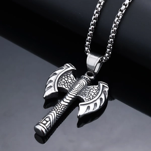 Vintage stainless steel double-sided Viking axe pendant with ornate relief engravings