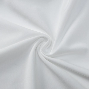 Macro detail of white mesh knit fabric texture and elegant spiral draped folds