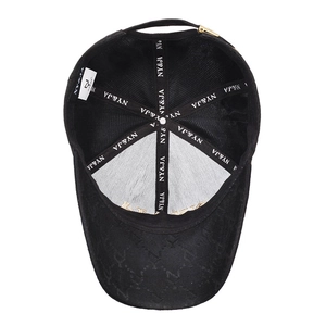 Fashionable black baseball cap with interior brand webbing and metal adjustment buckle