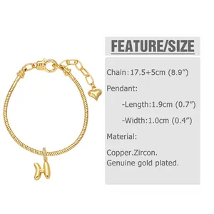 Detail view of gold heart letter bracelet with dimensions 17.5+5cm and zircon copper material