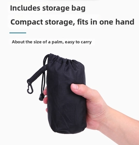 Close-up of lightweight black drawstring storage pouch with portable hook for backpack