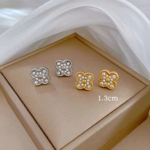 Titanium steel four-leaf clover stud earrings with pavé crystals in gold and silver set