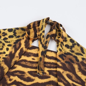 Detail of leopard print halter dress neck strap with high-quality stitching and fabric