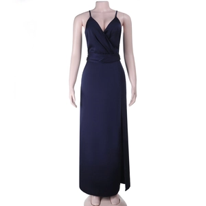 Detail view of deep blue satin dress featuring a high side slit and elegant deep V-neckline