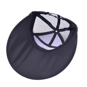 Detail view of large brim sun hat featuring breathable mesh top and reinforced stitching