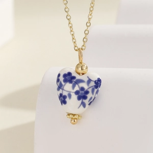 Vintage heart-shaped blue and white porcelain pendant necklace with 18K gold plated chain