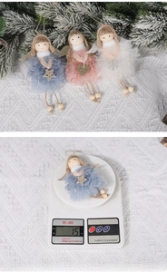 Detailed scale view of a 15g plush Christmas angel ornament with wings and sequins