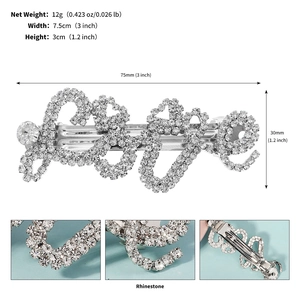 Detail view of silver rhinestone bow hair clip with product dimensions and back clip design