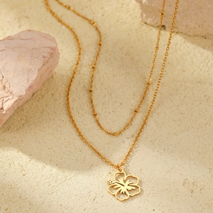 Double-layered 18K gold plated stainless steel necklace with hollow flower pendant charm