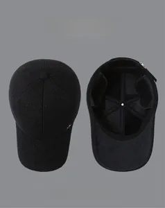 Detail view of men's winter baseball cap with thick fleece lining and ear flaps