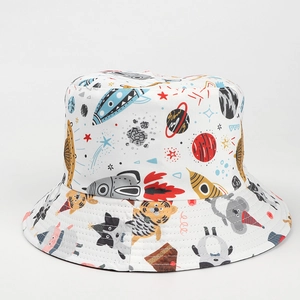 Detail of space and animal pattern printing on a reversible canvas bucket hat