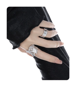 Close-up of S925 sterling silver leaf texture rings with inlaid zircons on hand