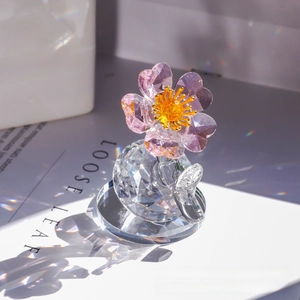 Detailed macro view of faceted pink crystal flower petals with sparkling prism light effects
