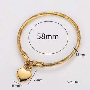 Twisted cable stainless steel heart pendant bangle with 58mm diameter and gold finish