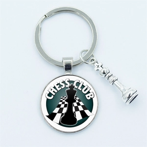 Chess Club glass dome keychain in silver metal with black and white chess board design