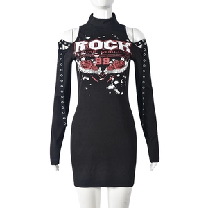 Detail of off-shoulder sleeve with metal eyelets and rib-knit texture on black dress