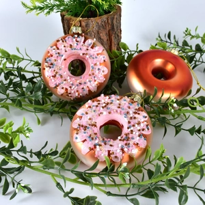Hand-painted glass donut Christmas ornaments with pink icing and orange metallic finish