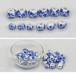 Macro detail of blue and white porcelain beads in different sizes for jewelry making