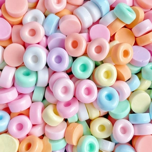 Macro view of colorful mini resin candy accessories for DIY hairpins and phone cases