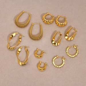 Various 18K gold plated stainless steel hoop earrings in textured and twisted designs
