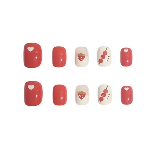 Short round strawberry and heart press-on nails in sweet red and white glossy finish
