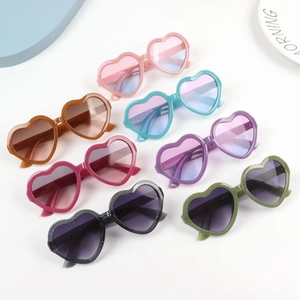 Glitter heart-shaped sunglasses for kids with gradient lenses in eight vibrant colors