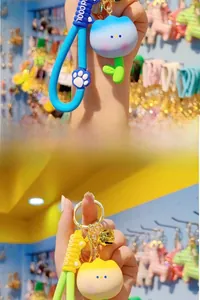 Detailed view of colorful resin tulip keychains with silicone wristbands and bells