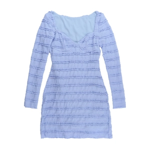 Detail of the heart neckline and ruched texture on this lilac long-sleeve mini dress