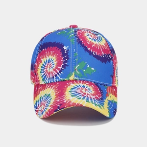 Detailed close-up showing the vibrant tie-dye pattern and stitching of the rainbow baseball cap