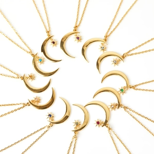 Macro detail of twelve S925 sterling silver necklaces with colorful star and moon pendants