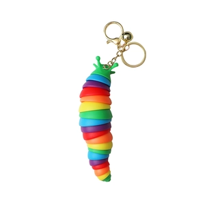 Rainbow slug keychain fidget toy with colorful flexible joints and gold clasp