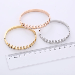 Three-color crown wave bangles with pave-set crystals and measuring ruler guide