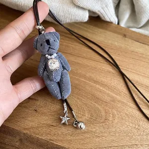 Collier avec pendentif ours en tissu denim bleu avec cristal et étoiles