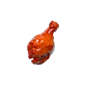Realistic roasted chicken drumstick phone grip holder with glossy sauce finish on white background