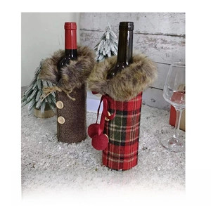 Side view of festive plaid Christmas wine bottle covers with plush faux fur collars