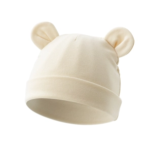 Detail of soft cotton knit newborn beanie featuring cute Mickey ears in cream color