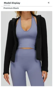 Three-piece athletic set featuring a black zip-up hoodie and lavender seamless leggings