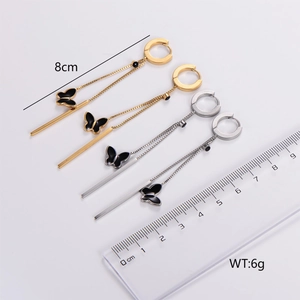 Detail of 8cm butterfly drop earrings in gold and silver stainless steel finishes