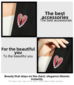 Detailed view of pink gradient angel wing brooch with sparkling rhinestones on lapel