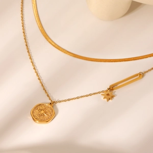 Double-layered gold stainless steel snake chain with a star embossed coin pendant