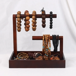 Double-tier dark wood jewelry display stand with T-bars and storage base tray
