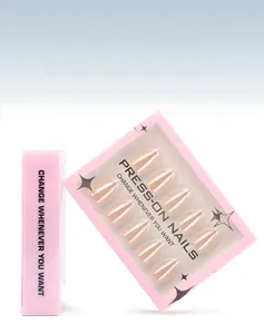Detail of 30pcs almond shaped nude pink press-on nails in pink window box packaging