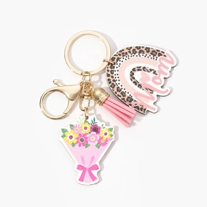 Wooden rainbow Mom keychain with colorful floral charm and pink tassel on gold ring