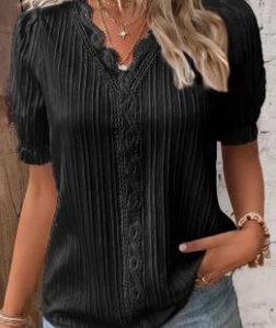 Detail of V-neck lace trim and pleated texture on black short sleeve summer blouse