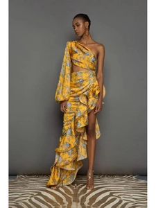 Macro detail of mustard floral one-shoulder dress with asymmetrical ruffle hem and silk texture