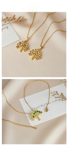 Detail of life tree pendant necklace with colorful zircon stones on gold titanium steel