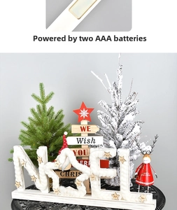 Detail of wooden NOEL Christmas sign powered by 2 AAA batteries for festive lighting