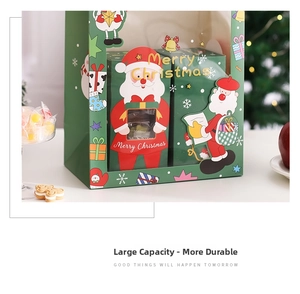 Close-up of forest green Christmas gift bag with Santa illustration and transparent window